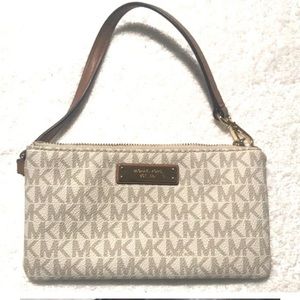 Authentic MK wristlet gray and taupe leather with gold zipper